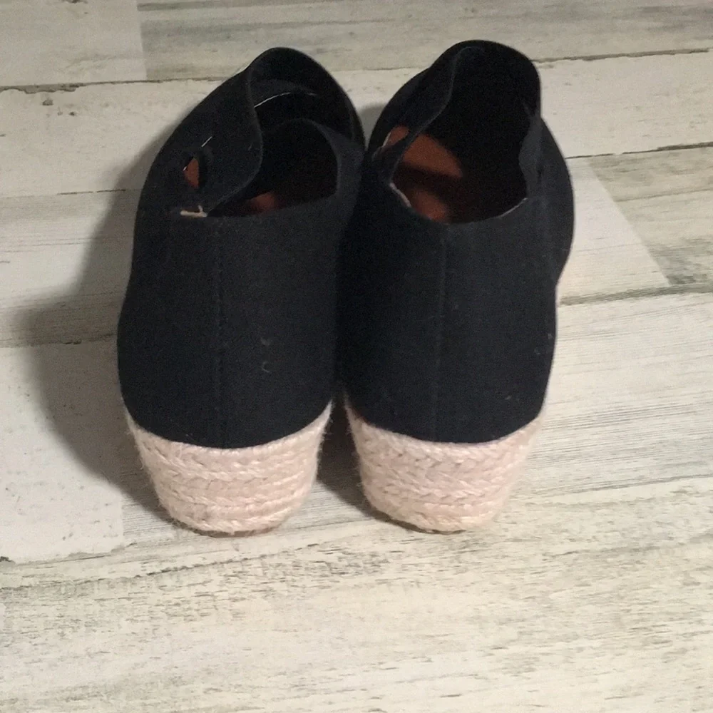 Black with white crochet toe raffia type wedge slip-on woman’s shoe size 7.5